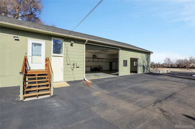 exterior space featuring a garage