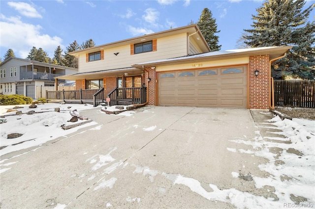 front of property featuring a garage and a porch