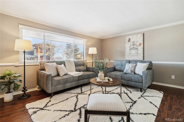 living room featuring dark wood-type flooring and ornamental molding