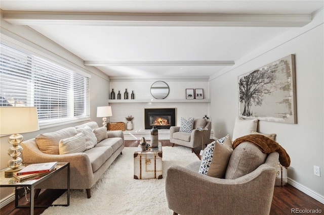 living room featuring wood-type flooring and beamed ceiling