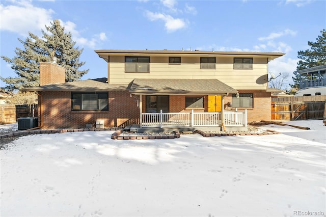 front of property with central AC unit and covered porch