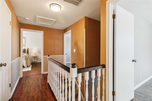 hallway with dark hardwood / wood-style floors