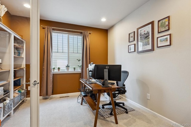 office space with light carpet, recessed lighting, and baseboards