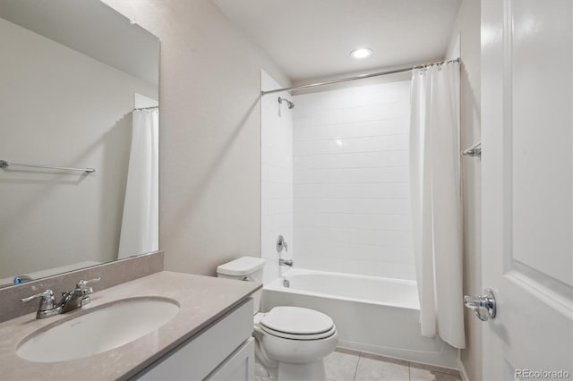 bathroom with vanity, shower / bath combo with shower curtain, tile patterned flooring, and toilet