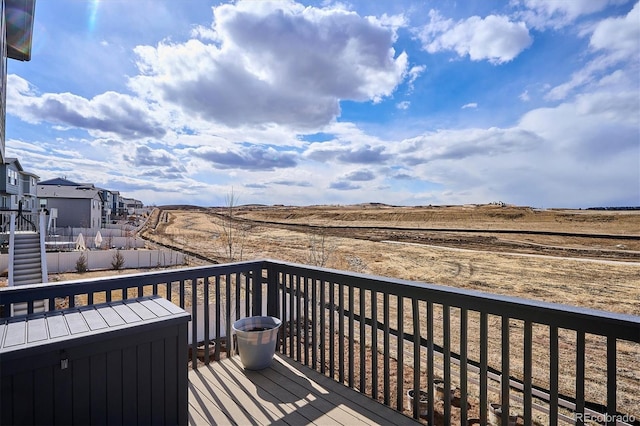 wooden deck featuring a residential view