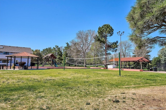 view of home's community featuring a gazebo, volleyball court, and a yard