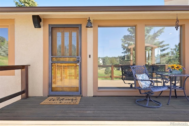 713 Aspen Rd, Golden, CO 80401 - doorway to property with stucco siding