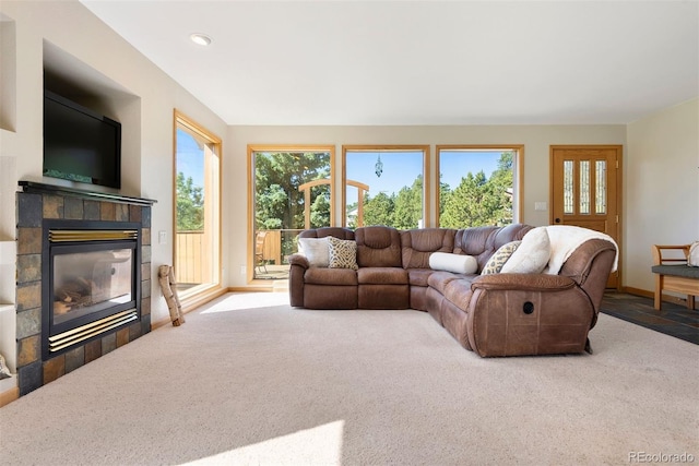 713 Aspen Rd, Golden, CO 80401 - living area with a tile fireplace, healthy amount of natural light, carpet, and recessed lighting