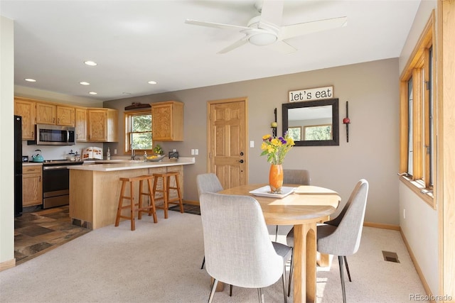 713 Aspen Rd, Golden, CO 80401 - carpeted dining room featuring recessed lighting and a ceiling fan