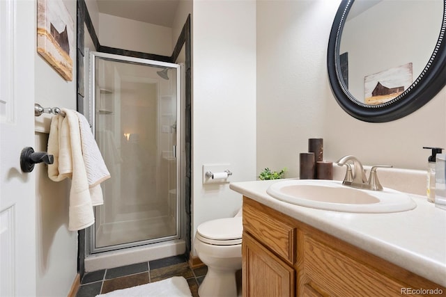 713 Aspen Rd, Golden, CO 80401 - bathroom featuring a shower stall, vanity, and tile patterned flooring