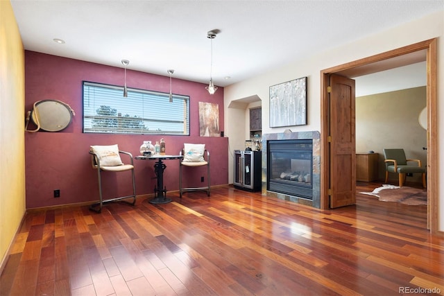 713 Aspen Rd, Golden, CO 80401 - dining area with hardwood / wood-style floors, a tile fireplace, and recessed lighting