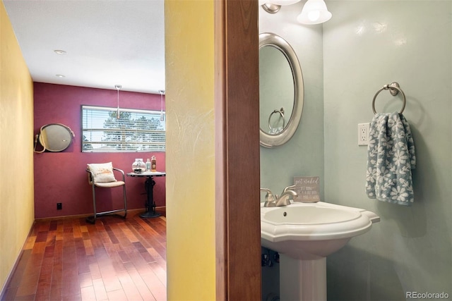 713 Aspen Rd, Golden, CO 80401 - bathroom featuring wood finished floors and baseboards