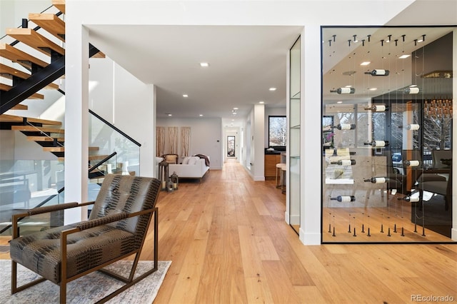 interior space featuring recessed lighting, stairway, and hardwood / wood-style floors