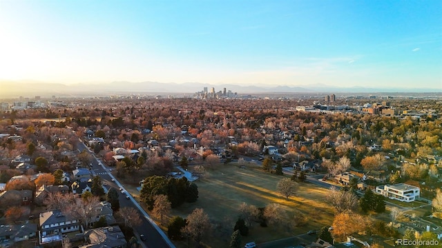 birds eye view of property with a mountain view