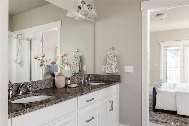 bathroom with an enclosed shower and vanity