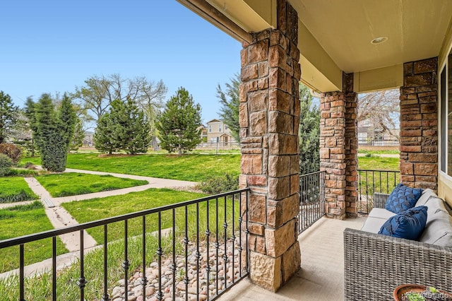 balcony featuring a porch
