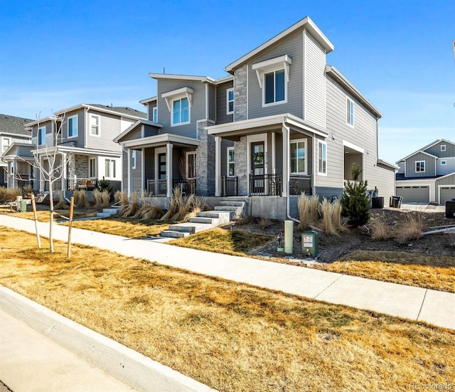 view of front of home featuring a residential view and covered porch