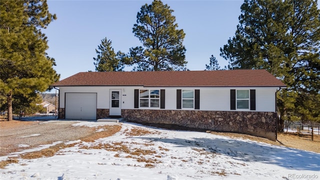 single story home with a garage