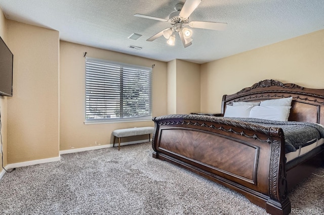 1179 S Fultondale Cir, Aurora, CO 80018 - carpeted bedroom with a textured ceiling, baseboards, and ceiling fan