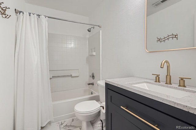 1179 S Fultondale Cir, Aurora, CO 80018 - bathroom with toilet, vanity, shower / bath combo with shower curtain, and marble look tiles