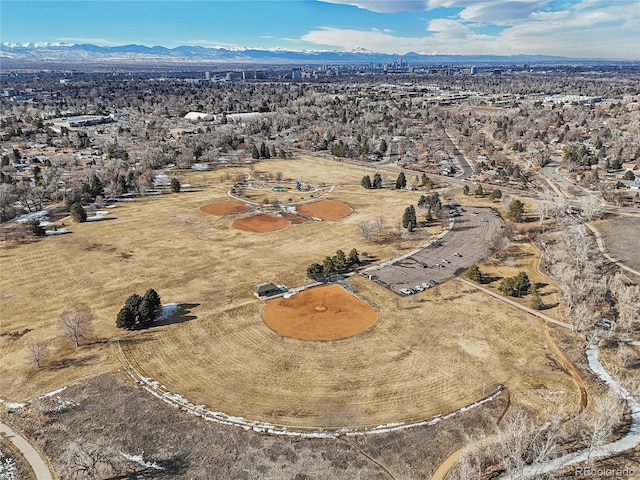 birds eye view of property with a mountain view