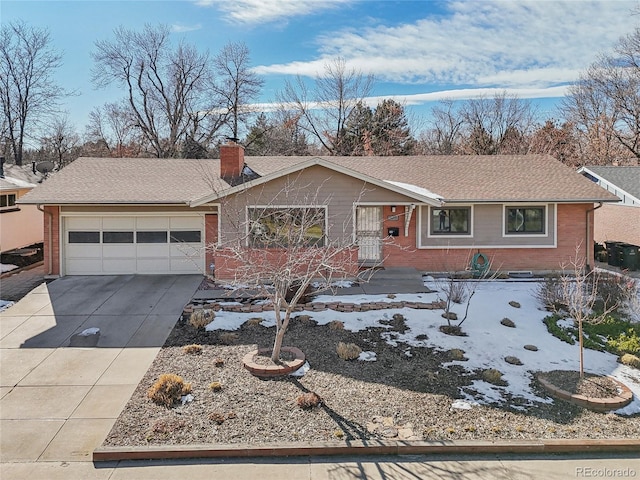 ranch-style home with a garage