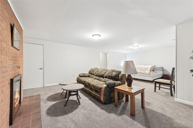 carpeted living room featuring a brick fireplace