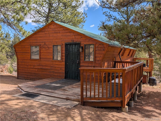 2117 Badger Creek Rd, Hartsel, CO 80449 - rear view of property with a deck and a metal roof