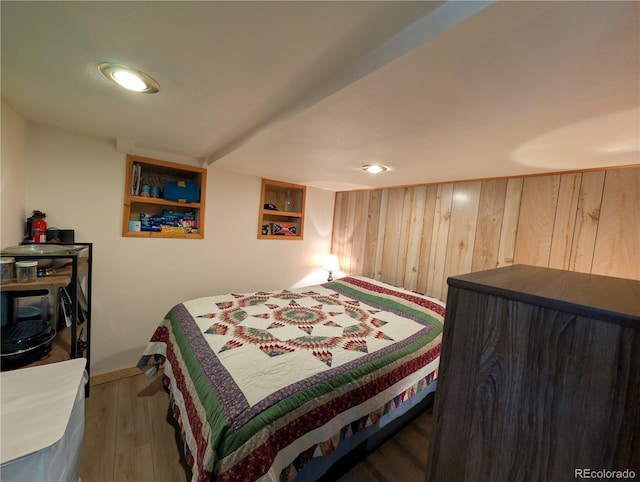 2117 Badger Creek Rd, Hartsel, CO 80449 - bedroom with wood finished floors and wooden walls