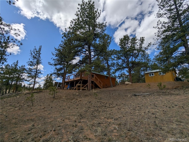 2117 Badger Creek Rd, Hartsel, CO 80449 - view of yard featuring stairway and a deck