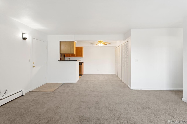 unfurnished living room with baseboards, a baseboard radiator, a ceiling fan, and light colored carpet