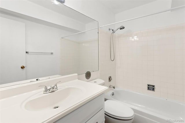 full bath featuring  shower combination, vanity, and toilet