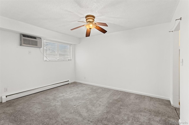 carpeted empty room featuring baseboard heating, an AC wall unit, ceiling fan, a textured ceiling, and baseboards