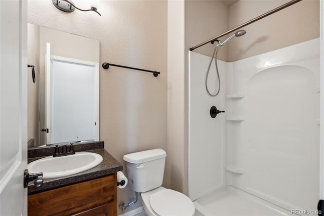 full bathroom with vanity and a shower