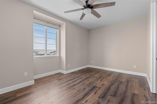 unfurnished room with hardwood / wood-style floors and ceiling fan