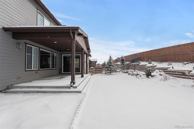 view of yard covered in snow