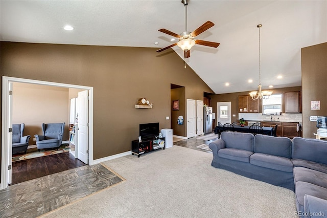 56607 E 23rd Ave, Strasburg, CO 80136 - living area featuring ceiling fan with notable chandelier, high vaulted ceiling, baseboards, and recessed lighting