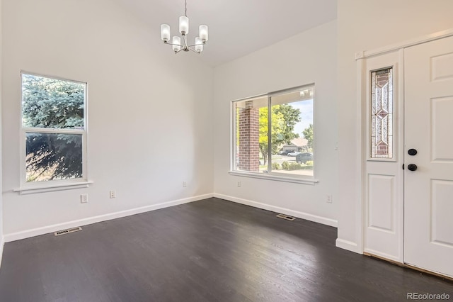 19033 E 22nd Cir, Aurora, CO 80011 - foyer with a chandelier, dark wood-style flooring, and high vaulted ceiling
