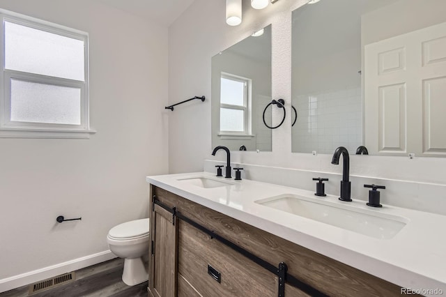 19033 E 22nd Cir, Aurora, CO 80011 - full bath with double vanity and wood finished floors