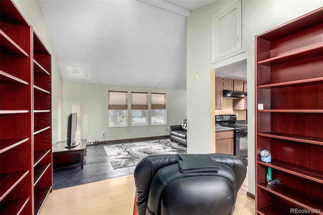 interior space with light wood finished floors and baseboards