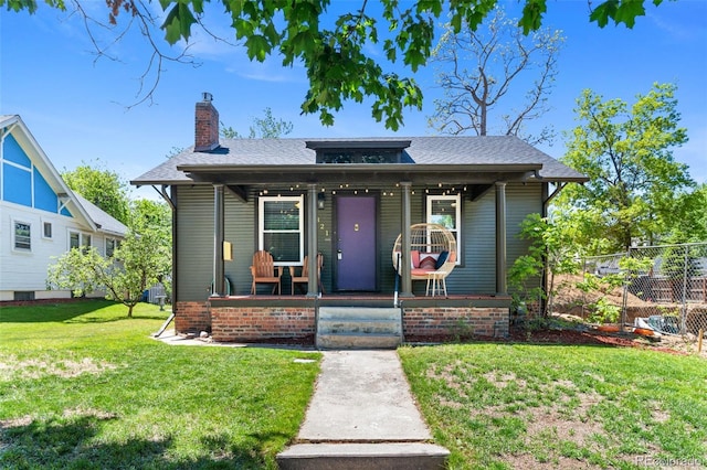 4321 Winona Ct, Denver, CO 80212 - bungalow-style home with a porch, a chimney, and roof with shingles
