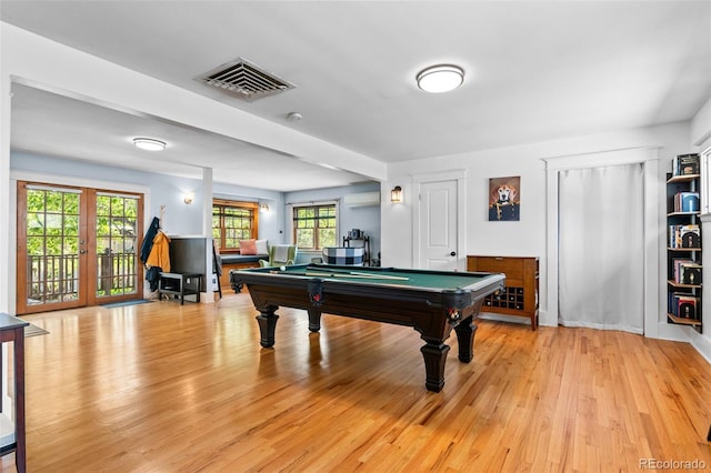 4321 Winona Ct, Denver, CO 80212 - game room featuring billiards table, light wood finished floors, and a wall unit AC