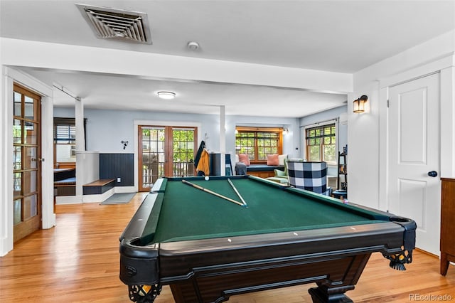 4321 Winona Ct, Denver, CO 80212 - playroom with light wood finished floors, pool table, and a wainscoted wall
