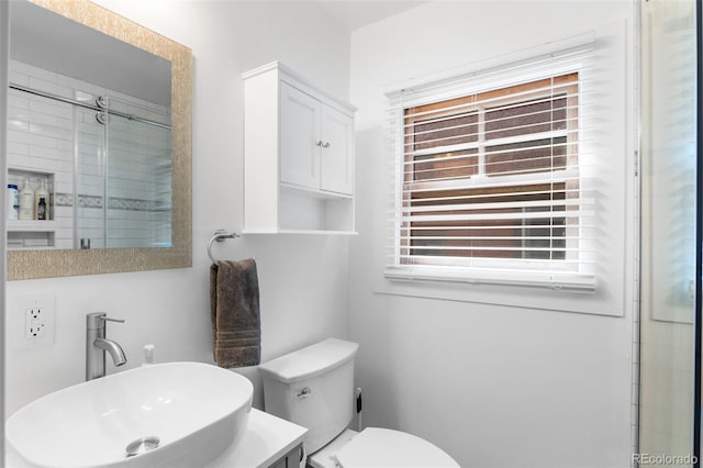 4321 Winona Ct, Denver, CO 80212 - full bathroom with toilet, vanity, and a shower with shower door