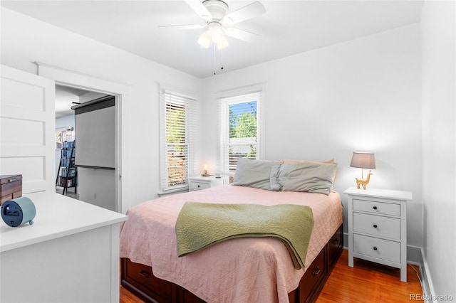 4321 Winona Ct, Denver, CO 80212 - bedroom featuring wood finished floors, ceiling fan, and baseboards