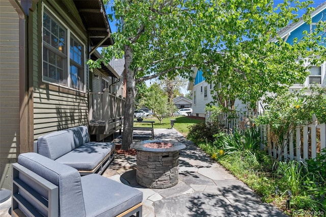 4321 Winona Ct, Denver, CO 80212 - view of patio with an outdoor living space with a fire pit