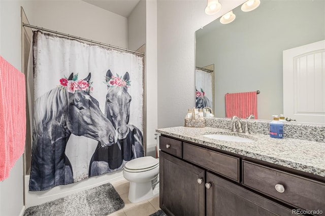 full bathroom featuring shower / bath combination with curtain, vanity, tile patterned floors, and toilet