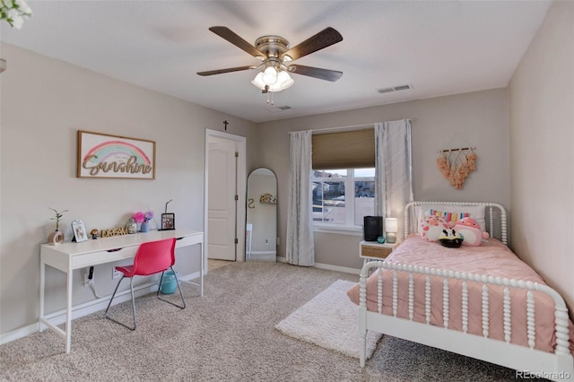 carpeted bedroom with baseboards, visible vents, and ceiling fan