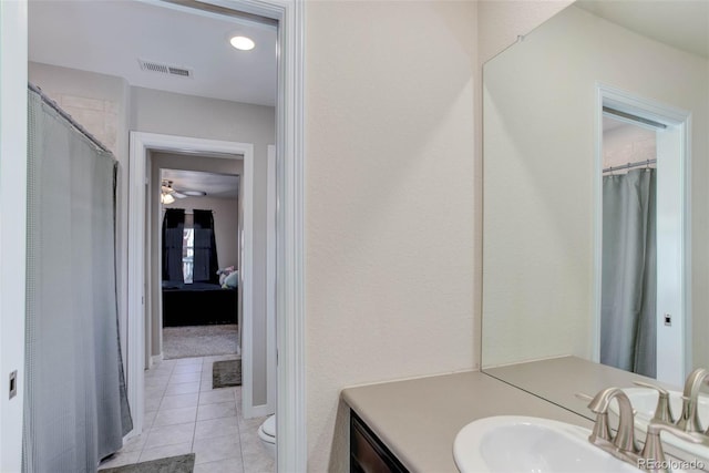 full bath featuring tile patterned floors, visible vents, toilet, a ceiling fan, and vanity