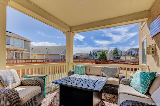 view of patio featuring a residential view and an outdoor living space